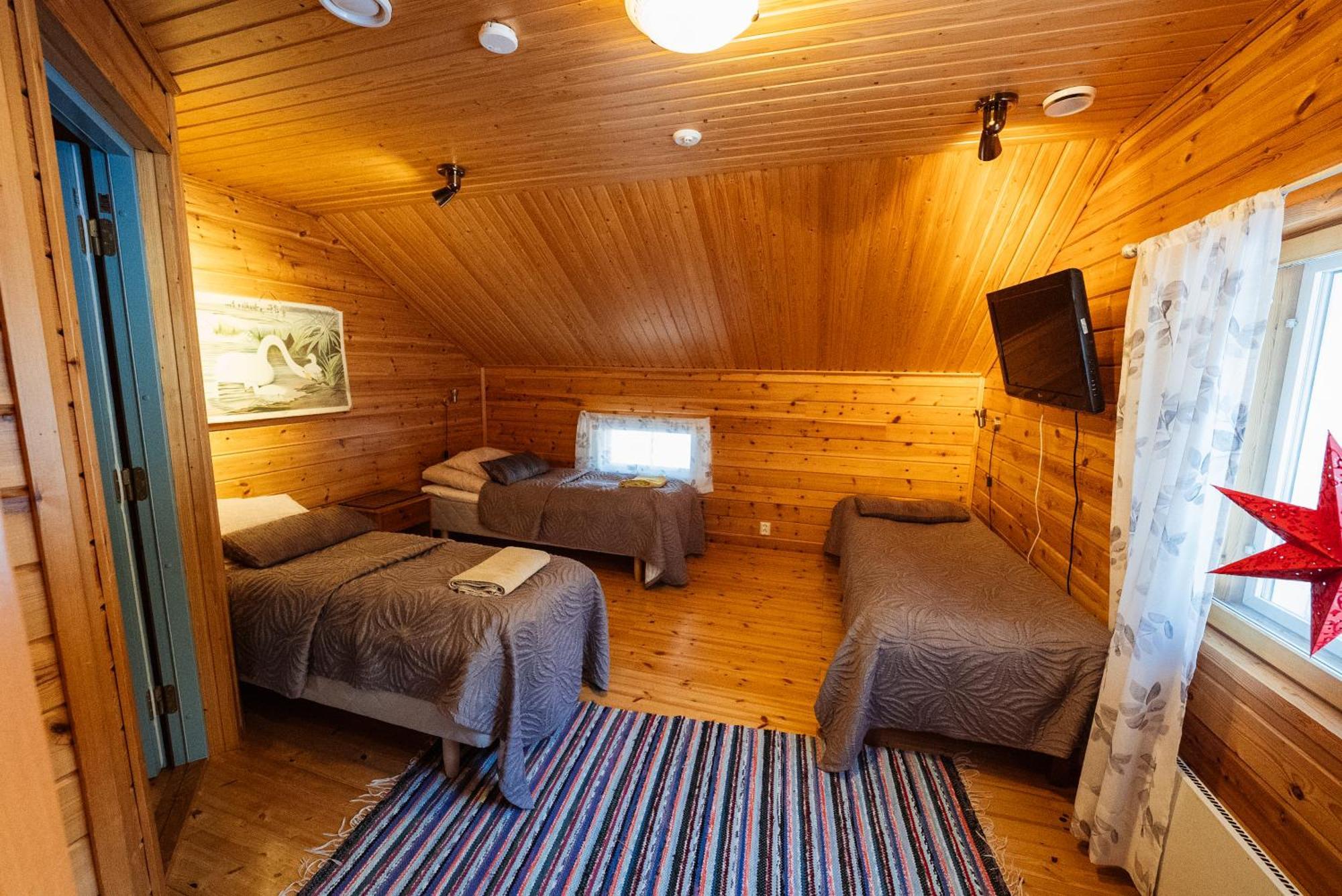 Napapiirin Jaervilomat Hotel Luukonniemi ภายนอก รูปภาพ